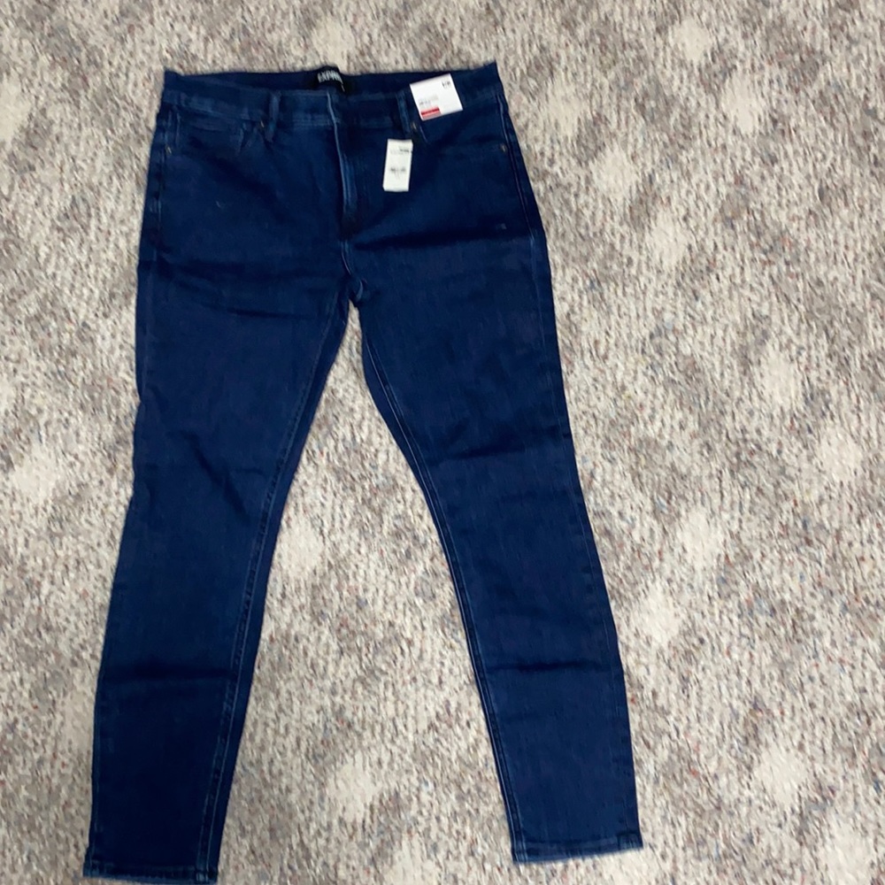 Dark blue stretchy jeans. Size 12-R